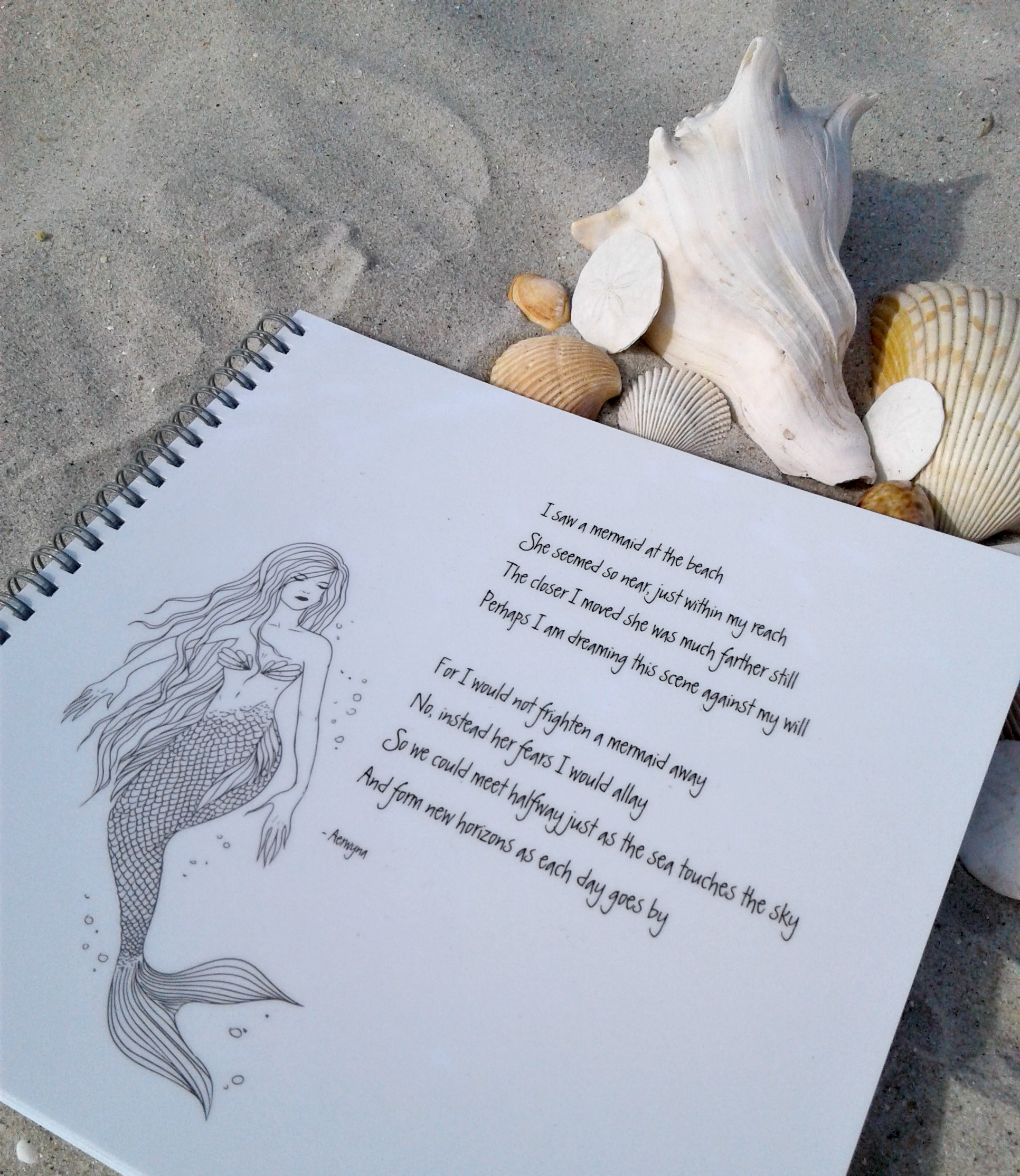 Notebook With Poem "I Saw A Mermaid At The Beach"